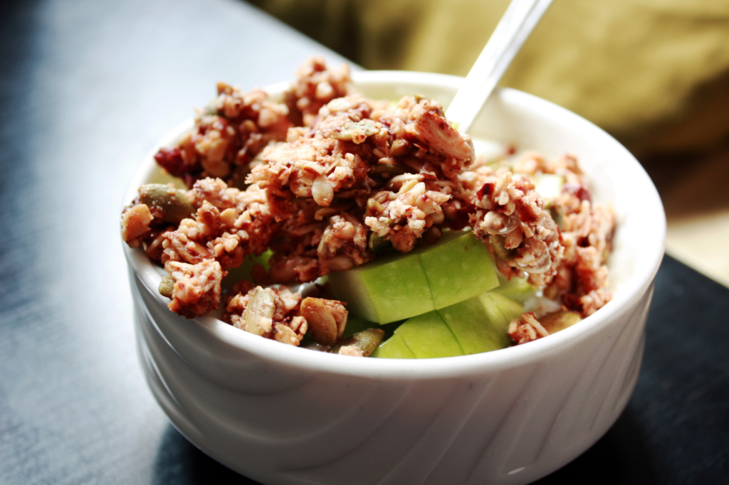 granola with nuts and dried fruit on yogurt