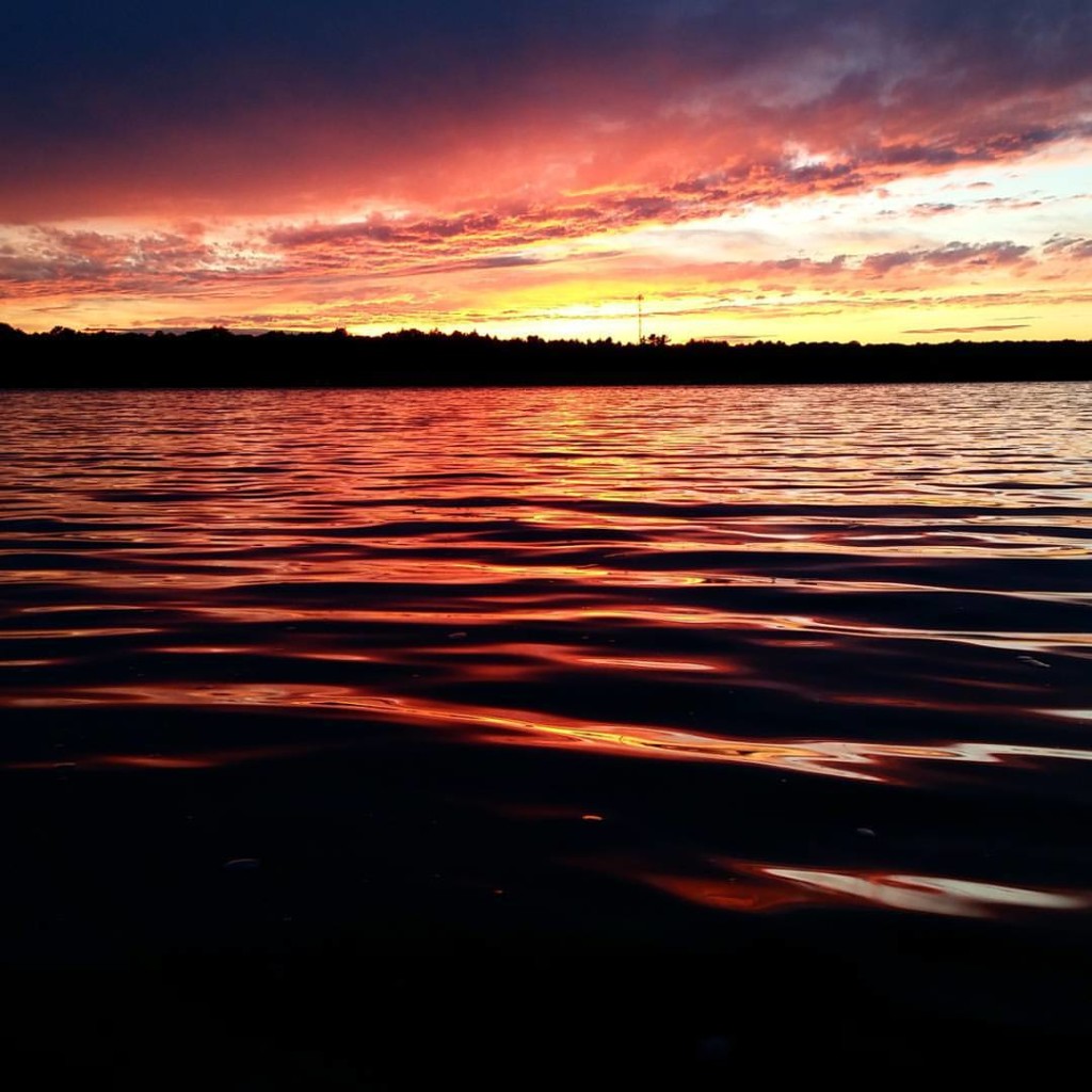 vibrant sunset over a lake in Northern Ontario