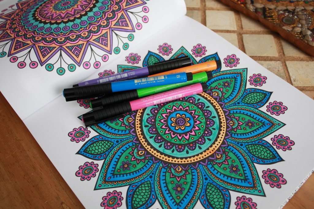 a pair of coloured mandalas from my mandala meditation colouring book