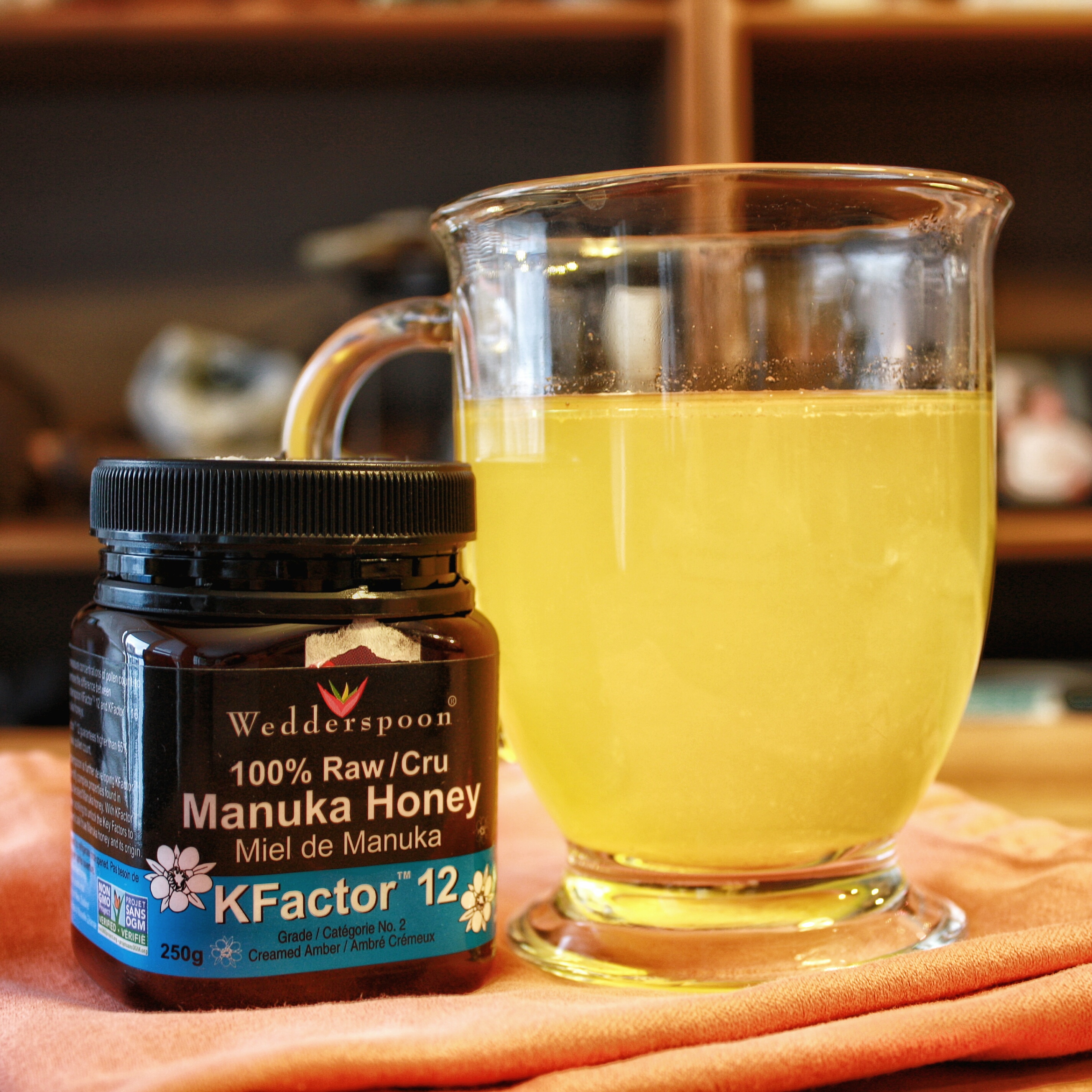 a hot mug of immunity elixir and manuka honey